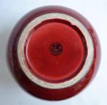 Paul MILET (1870-1950) pour SEVRES
Vase en faïence rouge dite sang-de-boeuf,...