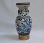CHINE Nankin
Vase en grès craquelé à décor bleu d'oiseau, fleurs...