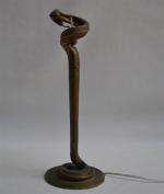 Edgar BRANDT (1880-1960) 
La Tentation
Pied de lampe en bronze anciennement...