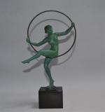 Marcel André BOURAINE (1886-1948)
Danseuse au cerceau
Sujet en fonte d'art à...