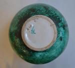 ANNEES 50
Vase boule en céramique à glaçure verte et blanche
H.:...