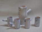 Jacques INNOCENTI (1926-1961)
Pichet et quatre tasses en céramique, signées et...