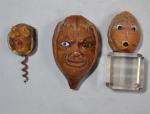 Trois NOIX sculptées de têtes de personnages
H.: 4.5 cm 6...