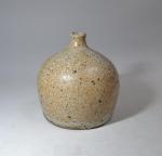 Gustave TIFFOCHE (1930-2011)
Vase à col rétréci en grès vernissé, signé
H.:...