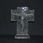 R. LALIQUE
Christ
Epreuve en verre blanc moulé pressé, modèle créé en...