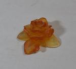 DAUM France
Fleur en verre teinté orange, signée
l.: 5.8 cm