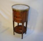 TABLE DE SALON de forme tambour en bois naturel et...