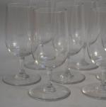 BACCARAT
Suite de huit verres flutes en cristal, signés
H.: 14 cm