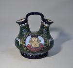 AMPHORA
Vase à anse en céramique émaillée à décor de personnage...
