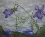 DAUM Nancy
Violettes
Coupe en verre à décor peint de violettes, signé...