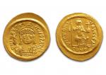 Justin II (565-578)
Solidus d'or. Constantinople. 4,47 g.
Son buste de face.
R/...