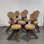 ANNEES 1950
Suite de huit chaises en bois naturel, les assises...