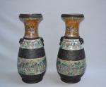CHINE Canton
Paire de vases en porcelaine à décor polychrome
XIXème
H.: 60...
