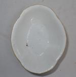 CHINE
Coupe ovale en porcelaine à décor polychrome
H.: 8 cm L.:...